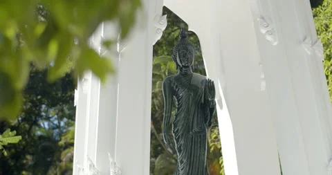 Close up green buddha statueTha Khanun Temple is a popular temple. Stock Footage 264894249