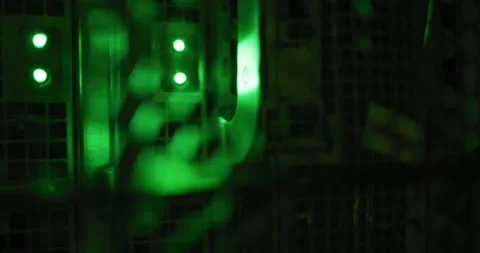 Close up of green control lights on computer servers in tech room Stock Footage 341088325
