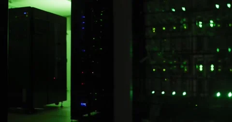 Close up of green control lights flashing on computer servers in tech room Vídeos de archivo 165134285