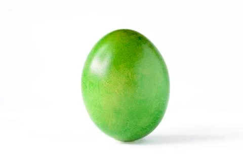 Close up of a green easter egg isolated on white. Stock-Fotos