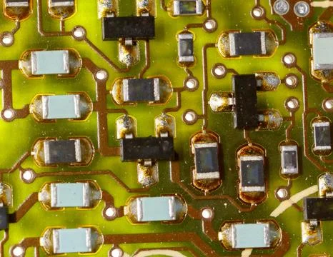 Close-up of a green electronic computer board with microchips Stock Photos