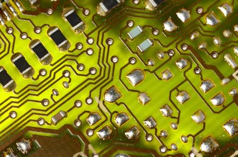 Close-up of a green electronic computer board with microchips Stock Photos