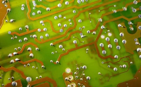 Close up of green electronic computer circuit board as background Stock Photos