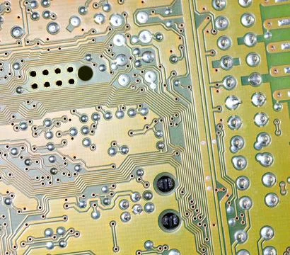 Close up of green electronic computer circuit board as background Stock Photos