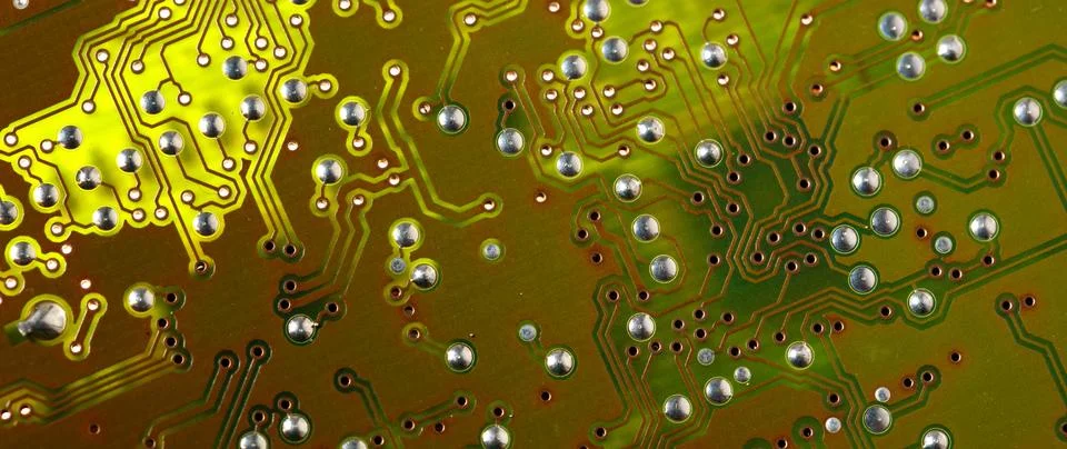 Close up of green electronic computer circuit board as background Stock Photos