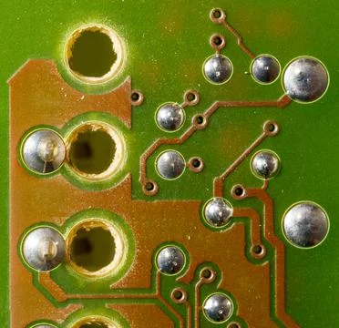 Close up of green electronic computer circuit board as background Stock Photos