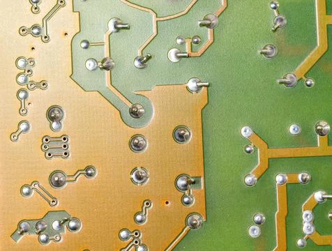 Close up of green electronic computer circuit board as background Stock Photos