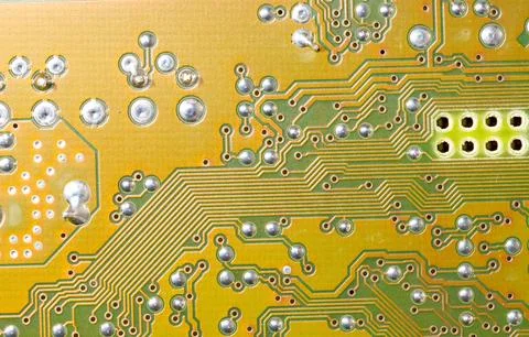 Close up of green electronic computer circuit board as background Stock Photos