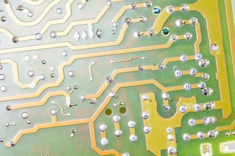 Close up of green electronic computer circuit board as background Stock Photos
