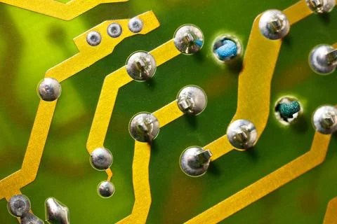 Close up of green electronic computer circuit board as background Stock Photos