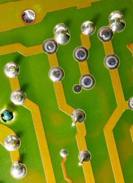 Close up of green electronic computer circuit board as background 写真素材