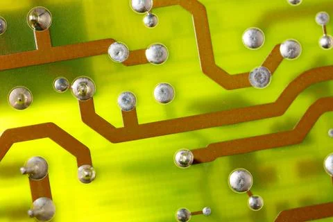 Close up of green electronic computer circuit board as background Stock Photos