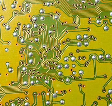 Close up of green electronic computer circuit board as background Stock Photos