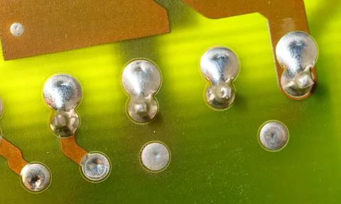 Close up of green electronic computer circuit board as background Stock Photos
