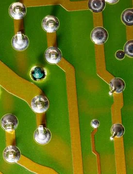 Close up of green electronic computer circuit board as background Stock Photos