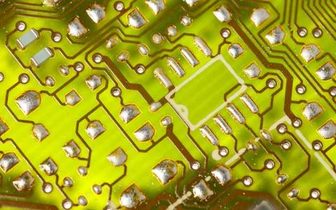 Close up of green electronic computer circuit board as background Stock Photos