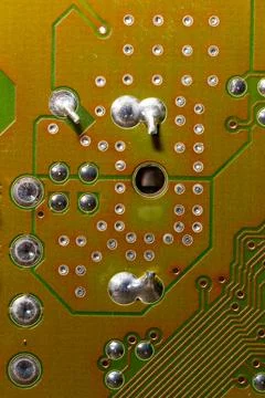 Close up of green electronic computer circuit board as background Stock Photos