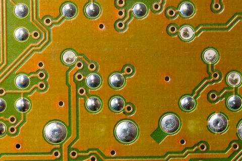 Close up of green electronic computer circuit board as background Stock Photos
