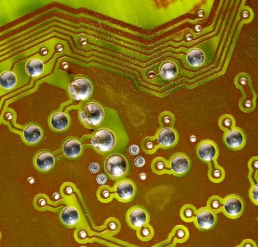 Close up of green electronic computer circuit board as background Stock Photos
