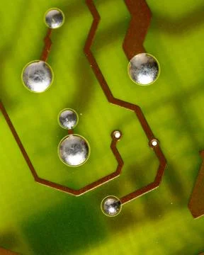 Close up of green electronic computer circuit board as background Fotos Stock