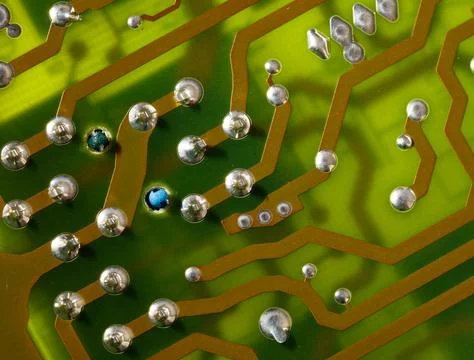 Close up of green electronic computer circuit board as background Stock Photos