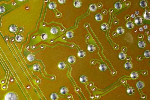 Close up of green electronic computer circuit board as background Stock Photos