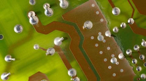 Close up of green electronic computer circuit board as background Stock Photos
