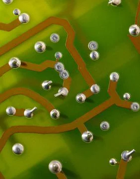 Close up of green electronic computer circuit board as background Stock Photos
