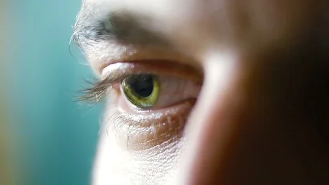 Close up green eye of man Stock Footage 73884996