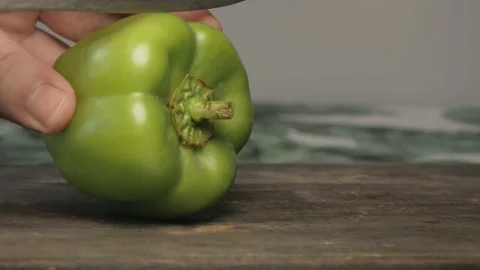 Close up of green fresh bell pepper cut in slices Stock Footage 134069305