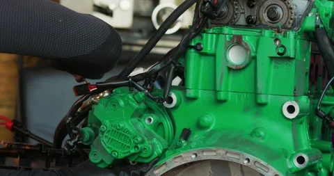 Close-Up of Green Mechanical Engine in Workshop 스톡 동영상 323344527