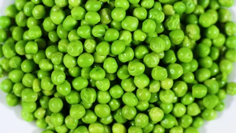 Close Up Green Peas Background Rotating. Macro Shot Fresh Organic Green Peas. Stock Footage 152982897
