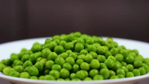 Close Up Green Peas Background Rotating. Macro Shot Fresh Organic Green Peas Stock Footage 221746261
