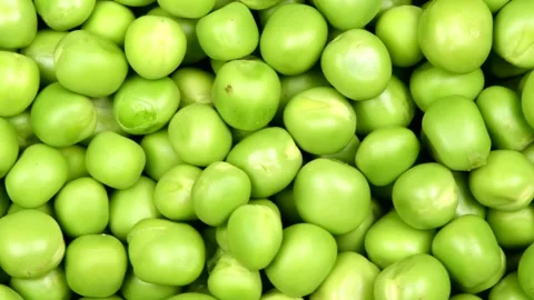 Close-up of green peas. Loop motion. Side view. Rotation 360. Stock Footage 160818748