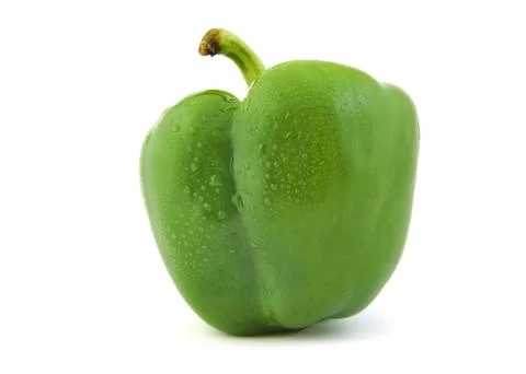Close up of green pepper on white background. Stock Photos