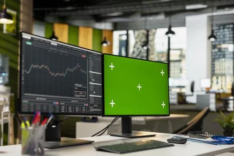 Close up of green screen computer displaying stock market candlestick graphs Foto stock