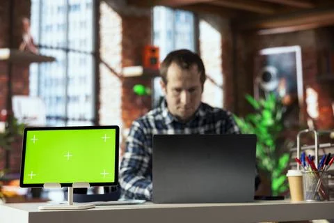 Close up of green screen device next to bookkeeper using spreadsheet software Stock Photos