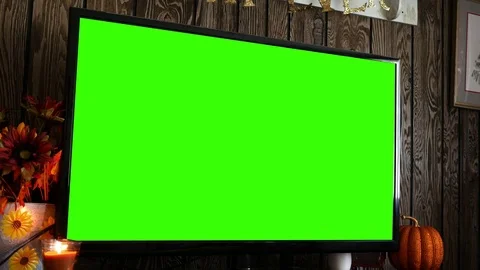 Close up of green screen HD / 4K TV in rustic fall decorated living room - ALT Video stock 81190482