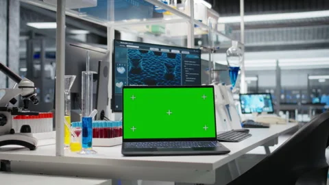 Close up of green screen laptop and computer program in laboratory Stock Footage 320729433