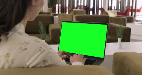 Close Up Green Screen Mock Up Laptop Computer. Device is Used on a Hotel Lobby.  Video stock 154336076