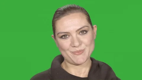 Close up of a green screen shooting of a smiling woman Stock Footage 72690043