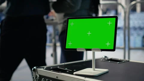 Close up of green screen tablet in front of data center engineers improving rigs Stock Footage 314686101