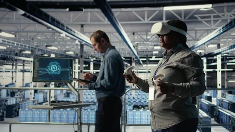Close up of green screen tablet in front of data center engineers improving rigs Stock Footage 314805697