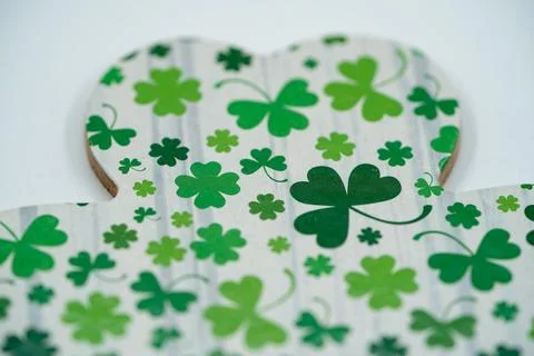 Close up of green shamrock pattern on white background Stock Photos