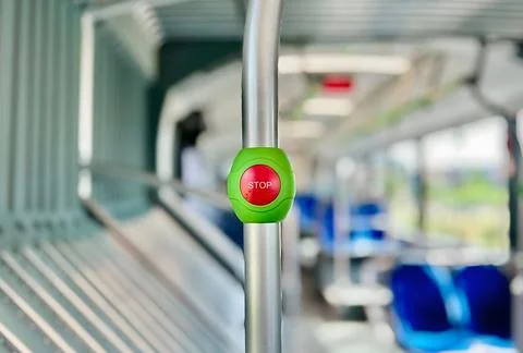 Close Up of Green Stop Button Inside Modern Public Transport Bus or Tram Stock Photos