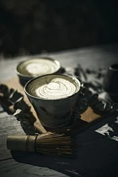 Close Up Of Green Tea Latte On Table Stock Photos