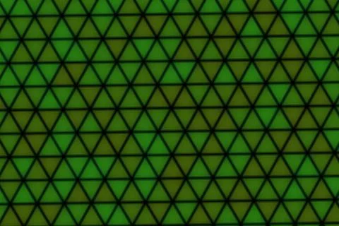 Close-up of green triangle pattern on textured surface 스톡 일러스트