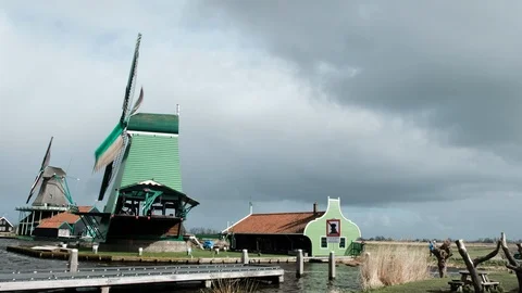 A close up of a green windmill at zaanse schans near amsterdam in the netherland Stock Footage 110774232