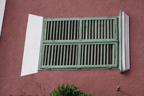 A close up of a green window Stock Photos