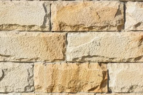 Close up grey bricks wall background Stock Photos
